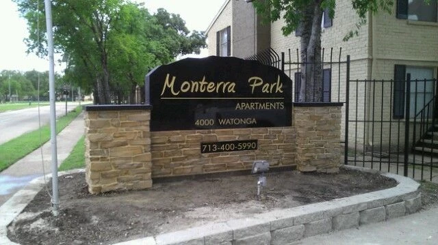 Apartment Complex in the Houston area stone and granite exterior sigange